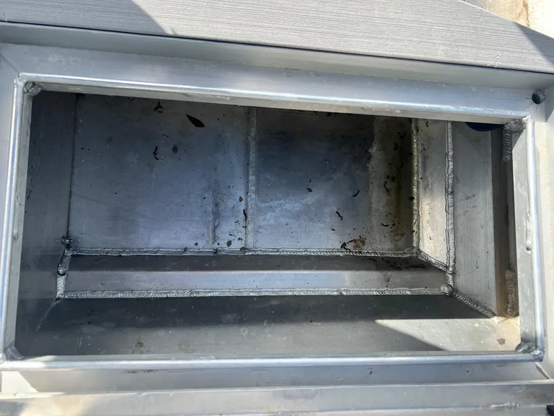 Slide: The Image of Metallic compartment of Hanko 185 CCLS, 2022 model, showing interior welds and slight debris. - 6