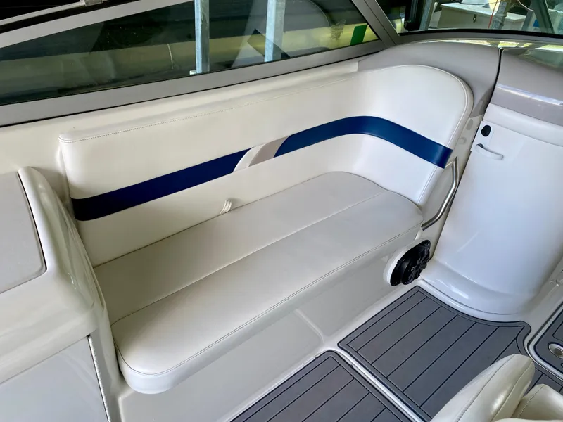 Slide: The Image of 2000 Formula 280 Bowrider interior with white and blue seating, sleek design. - 15