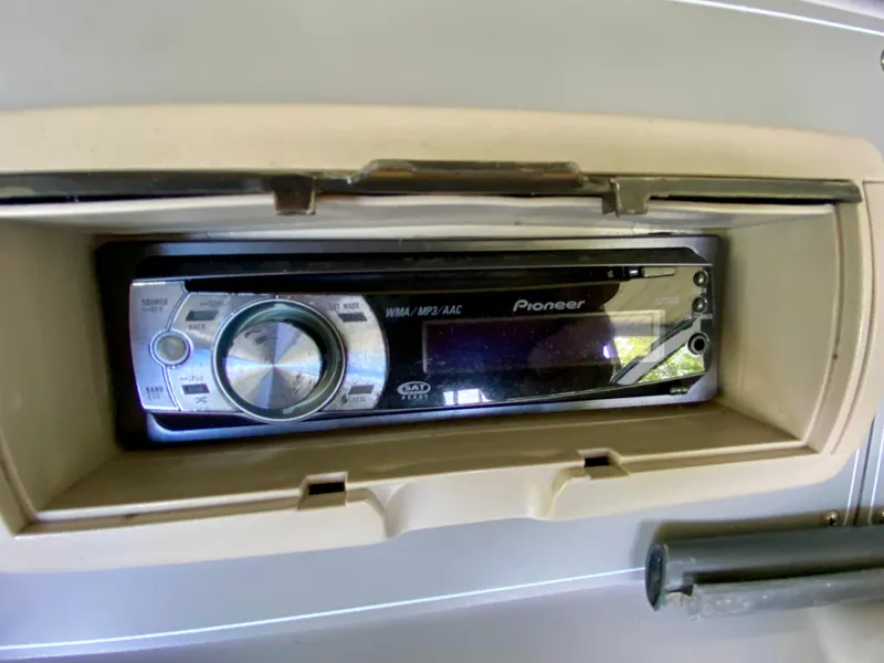 Slide: The Image of Pioneer stereo system in a 2000 Formula 280 Bowrider boat dashboard. - 18