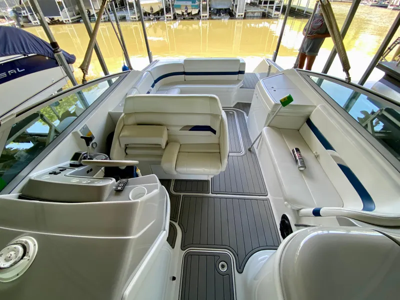 Slide: The Image of 2000 Formula 280 Bowrider interior with white seating and modern design. - 19