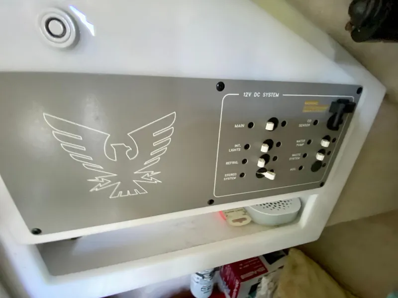 Slide: The Image of Control panel of a 2000 Formula 280 Bowrider boat with eagle emblem. - 23