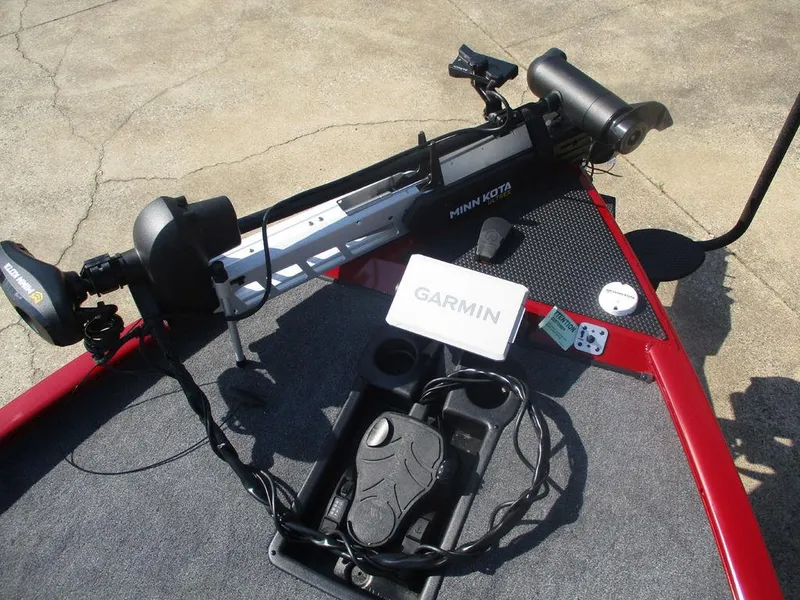 Slide: The Image of 2025 Tracker SAVAGE™ 215 boat with Garmin and Minn Kota equipment on deck. - 7