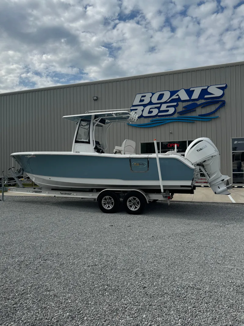 Slide: The Image of 2023 Sea Hunt Ultra 255 SE boat on trailer at Boats 365 dealership. - 12