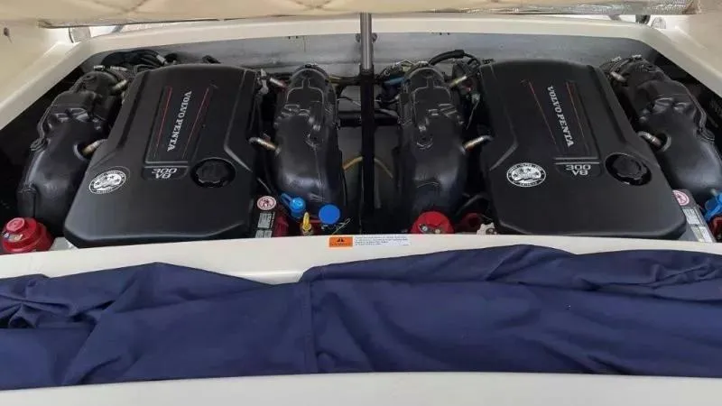 Slide: The Image of Twin Volvo Penta engines in a 2017 Chris-Craft Launch 28 boat. - 19