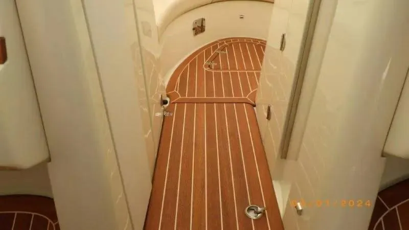 Slide: The Image of 2017 Chris-Craft Launch 28 interior with elegant wooden flooring. - 20