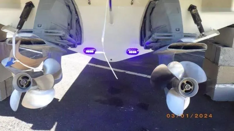 Slide: The Image of 2017 Chris-Craft Launch 28 boat with dual propellers and underwater lights. - 24