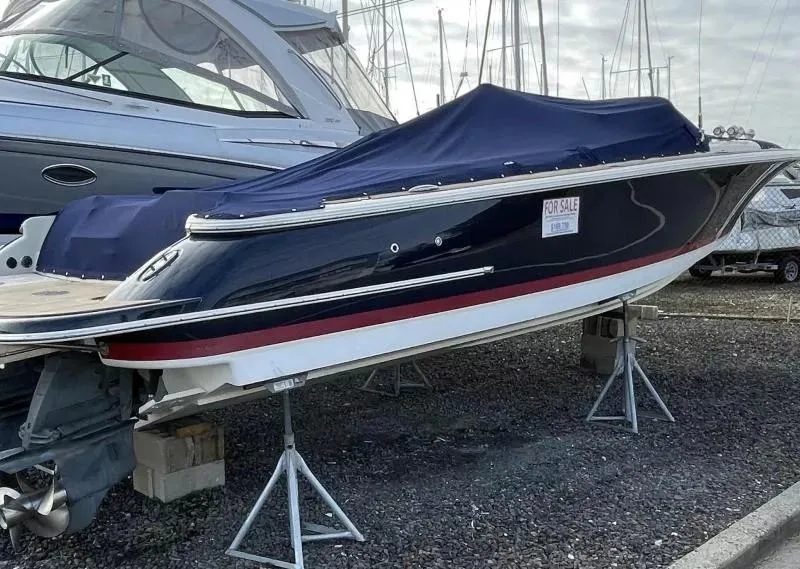 Slide: The Image of 2017 Chris-Craft Launch 28 boat for sale, covered and elevated on stands. - 3