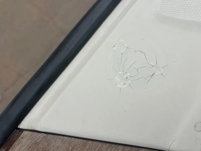 Slide: The Image of Cracked surface on 1983 Boston Whaler 25 Outrage boat deck. - 33
