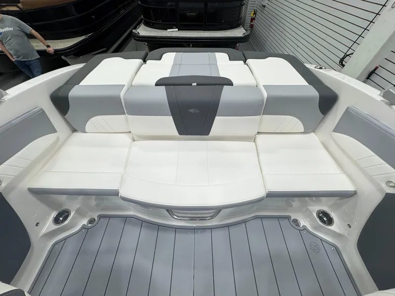 Slide: The Image of 2025 Chaparral 21 SSi boat interior with white and gray seating. - 10