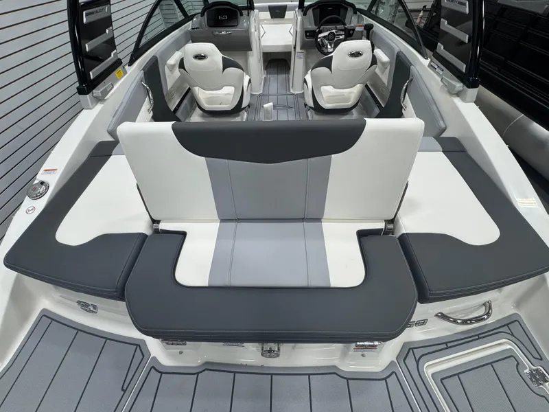 Slide: The Image of 2025 Chaparral 21 SSi boat interior with modern seating and sleek design. - 6
