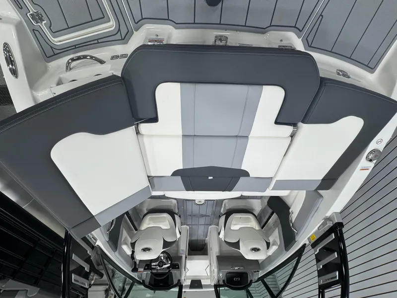 Slide: The Image of 2025 Chaparral 21 SSi boat interior with modern seating and sleek design. - 7