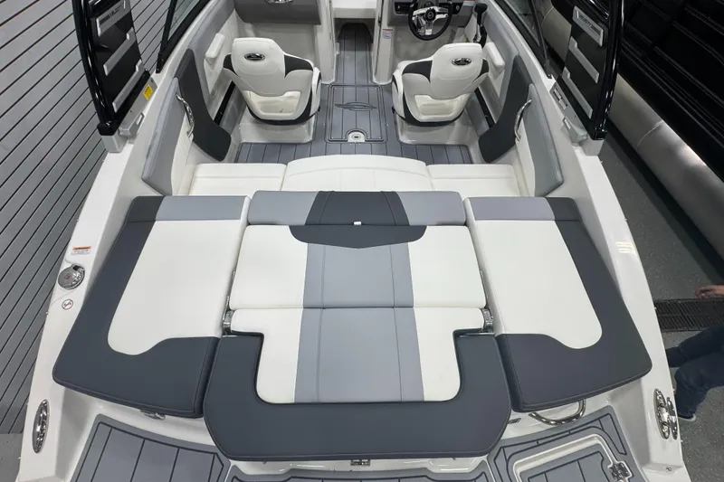 Slide: The Image of 2025 Chaparral 21 SSi boat interior with sleek seating and modern design. - 8