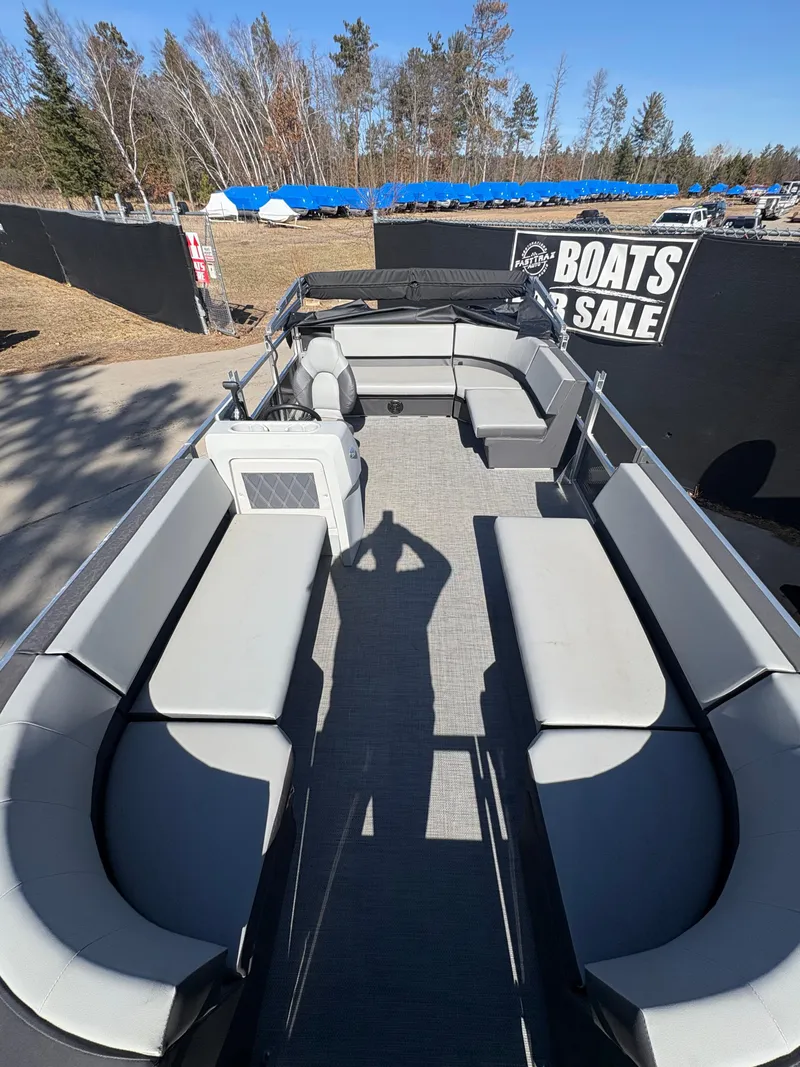 Slide: The Image of 2025 Custom Maui 160 Cruise boat with spacious seating, displayed for sale outdoors. - 8