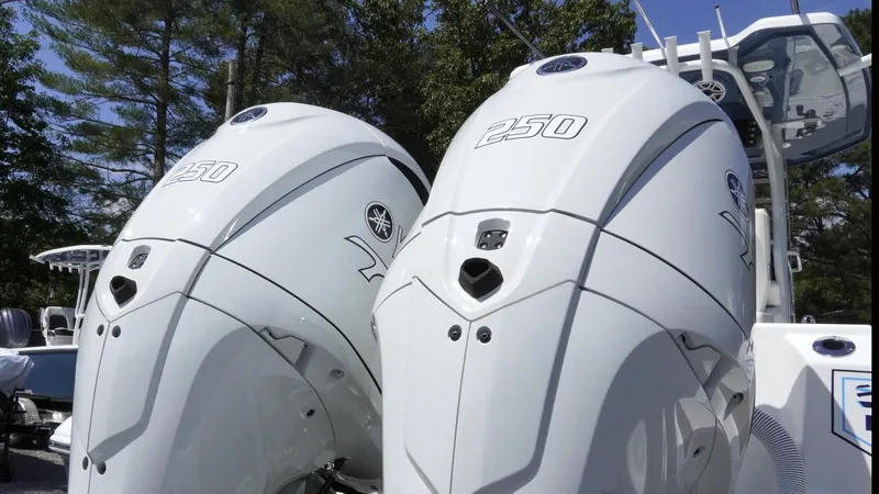 Slide: The Image of Twin Yamaha 250 outboard engines on a 2025 Tidewater 282 CC Adventure boat. - 16