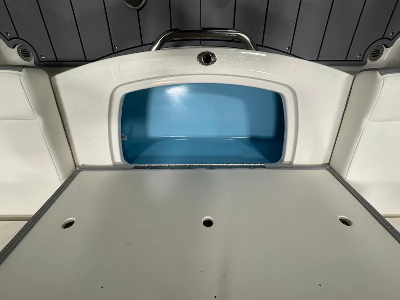 Slide: The Image of 2025 Chaparral 21 SSi boat interior with sleek, modern seating and stylish design. - 11