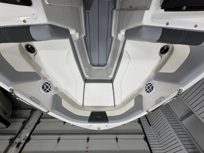 Slide: The Image of 2025 Chaparral 21 SSi boat interior, featuring sleek design and modern seating arrangement. - 22