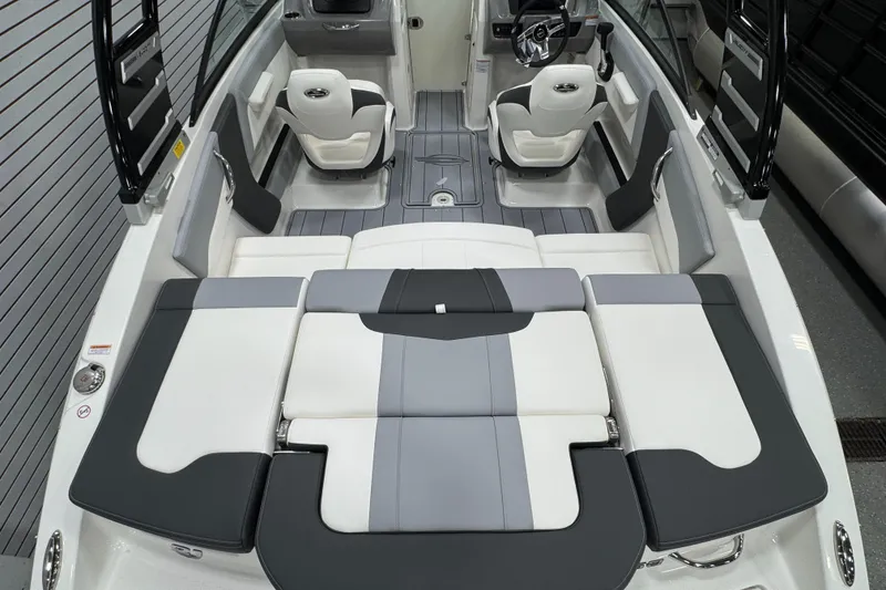 Slide: The Image of 2025 Chaparral 21 SSi boat interior with modern seating and sleek design. - 24