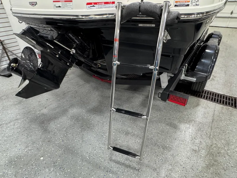 Slide: The Image of Rear view of 2025 Chaparral 21 SSi boat with propeller and seating. - 6