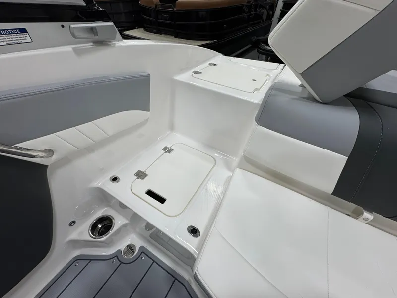 Slide: The Image of 2025 Chaparral 21 SSi boat interior with adjustable seating and modern design. - 9