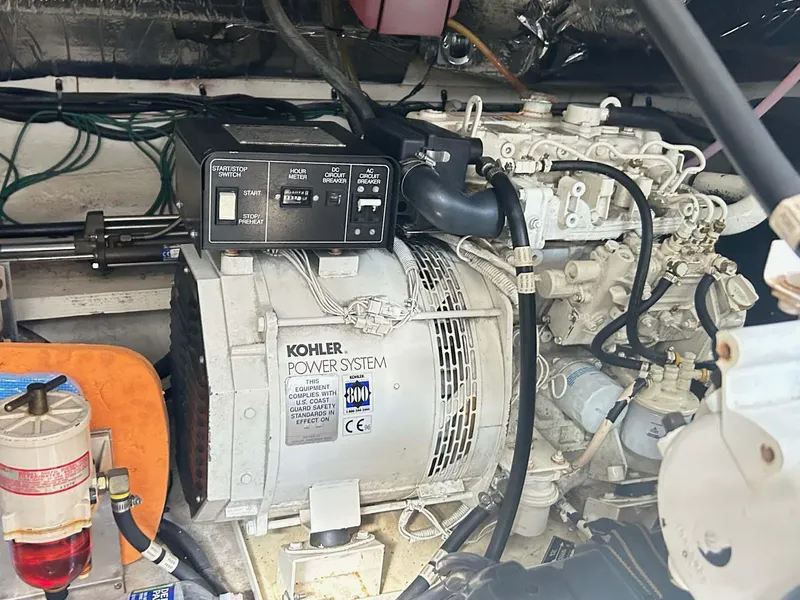 Slide: The Image of Engine room of 1997 Cruisers Yachts 4270 Esprit with Kohler power system. - 17