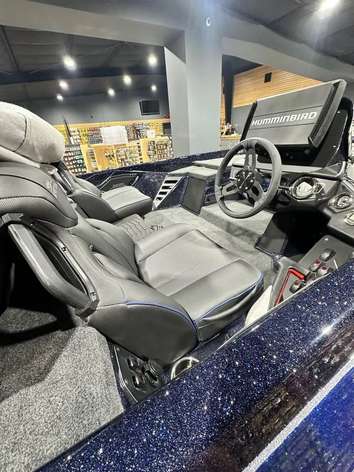 Slide: The Image of 2025 Skeeter ZXR21 boat interior with sleek seats and advanced Hummingbird navigation system. - 4