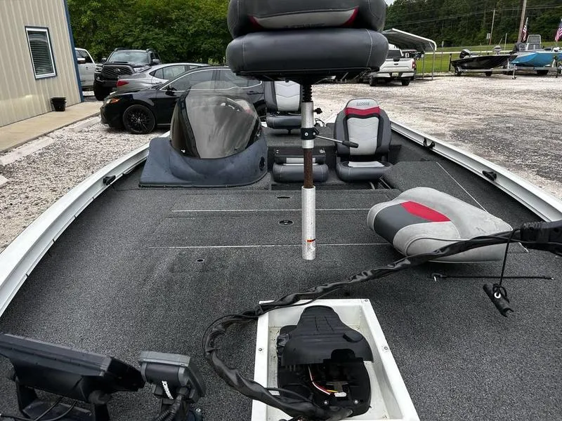 Slide: The Image of 2017 Lowe Stinger 175 boat interior with seating and control panel. - 11