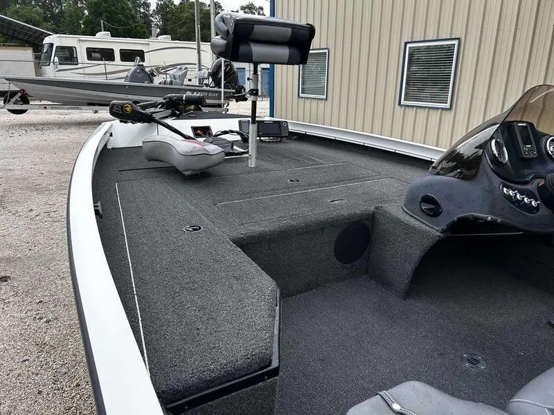 Slide: The Image of 2017 Lowe Stinger 175 boat interior with fishing deck and control console. - 12