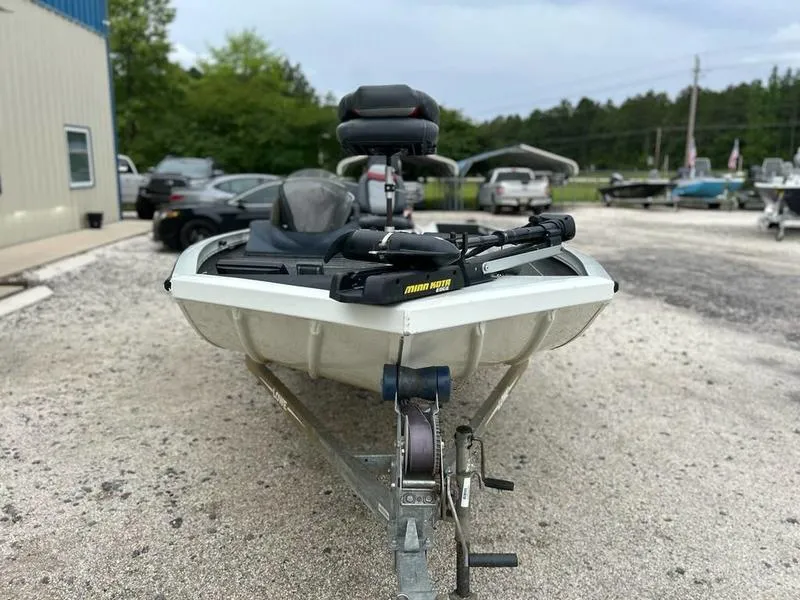 Slide: The Image of 2017 Lowe Stinger 175 boat on trailer, parked outdoors. - 2