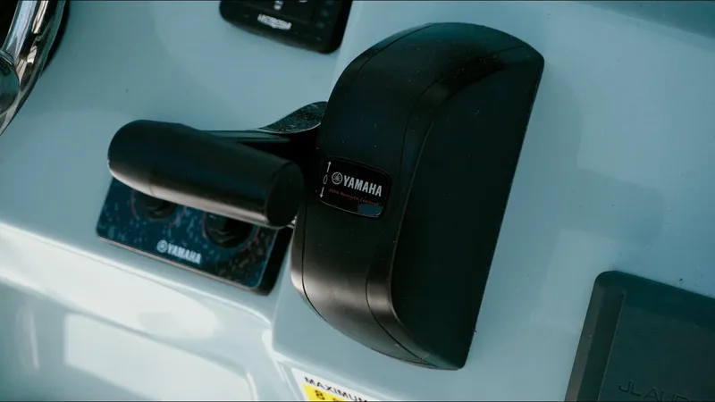 Slide: The Image of Throttle control of a 2025 Tidewater 210 LXF boat with Yamaha branding. - 27