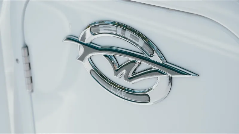 Slide: The Image of 2025 Tidewater 210 LXF logo on sleek white surface. - 33