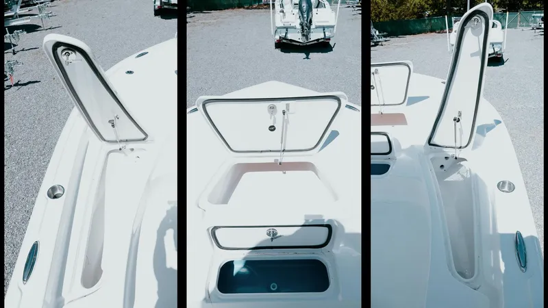 Slide: The Image of 2025 Tidewater 210 LXF boat storage compartments, open and ready for use. - 35