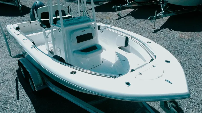 Slide: The Image of 2025 Tidewater 210 LXF boat on trailer, sleek design, ready for adventure. - 9