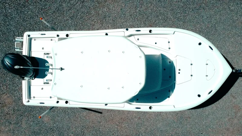 Slide: The Image of Overhead view of 2025 Tidewater 2210 Carolina Bay boat on gravel surface. - 4