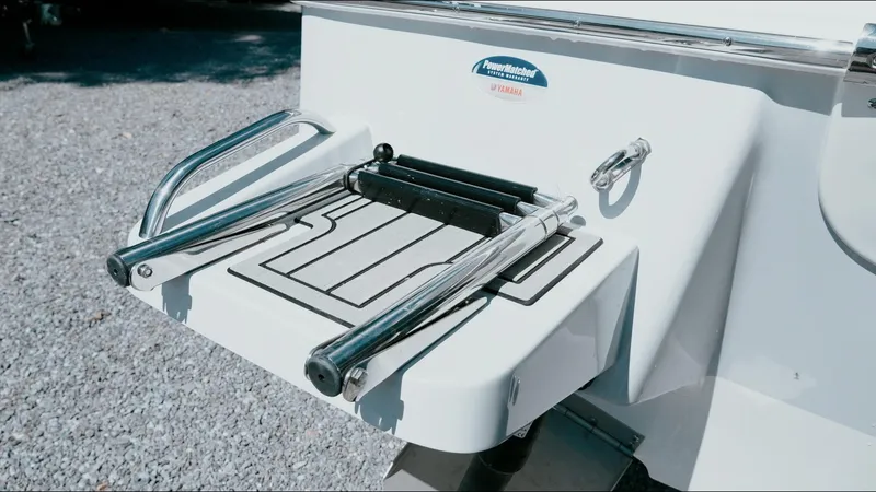 Slide: The Image of 2025 Tidewater 2210 Carolina Bay boat swim platform with stainless steel ladder. - 7