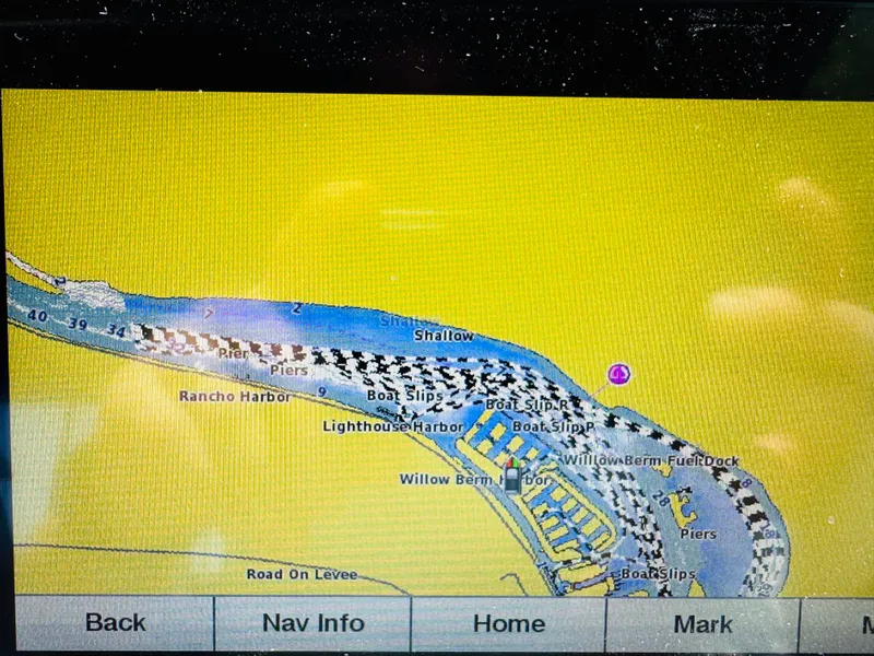Slide: The Image of Navigation map display showing harbors, boat slips, and piers on a Cobalt 293, 1998 model. - 28