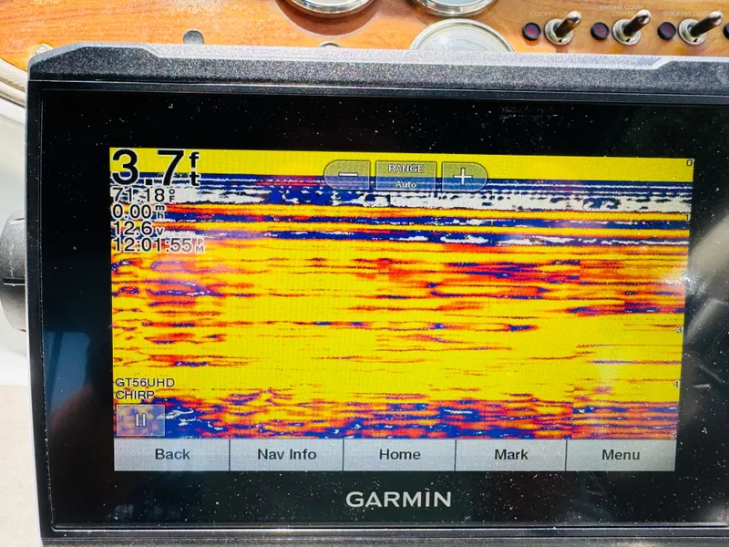Slide: The Image of Garmin fishfinder display on a 1998 Cobalt 293 boat, showing sonar data and depth readings. - 29