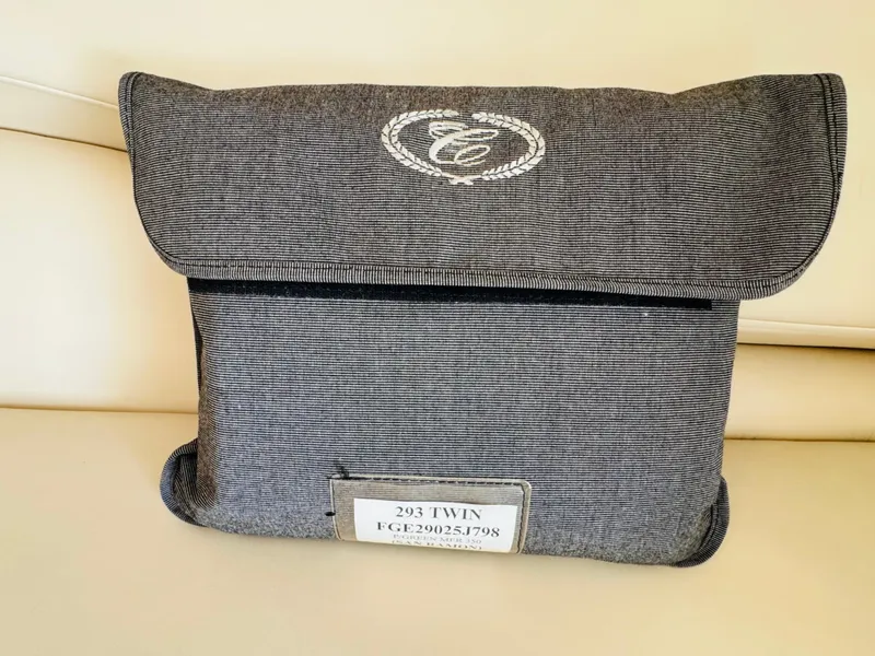 Slide: The Image of Gray fabric pouch with embroidered logo, labeled "293 TWIN," from a 1998 Cobalt 293 model. - 43