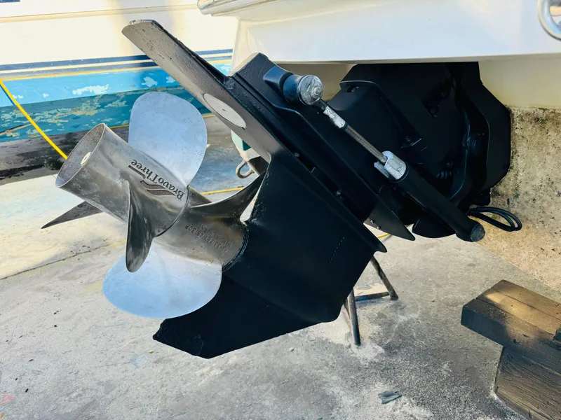 Slide: The Image of Propeller and outdrive of a 1998 Cobalt 293 boat on a trailer. - 45