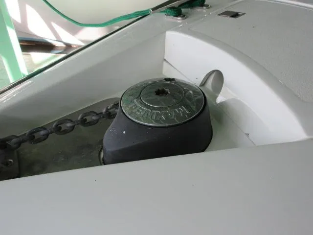 Slide: The Image of Anchor windlass on 1998 Cobalt 293 boat deck. - 8
