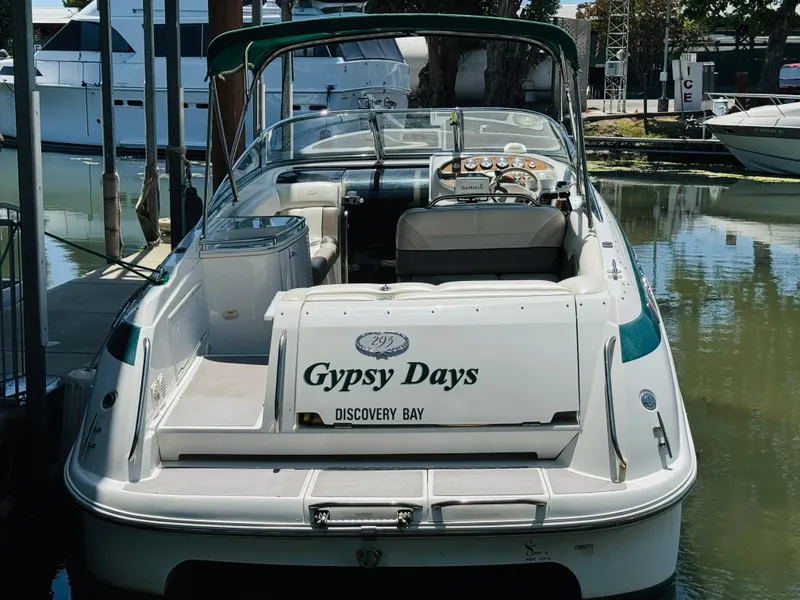 Slide: The Image of Cobalt 293 boat from 1998 named "Gypsy Days" docked at Discovery Bay. - 9