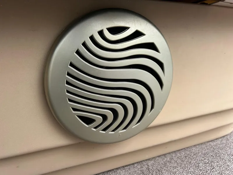 Slide: The Image of Speaker grille on 2017 Sun Tracker Fishin' Barge 22 DLX pontoon boat. - 22