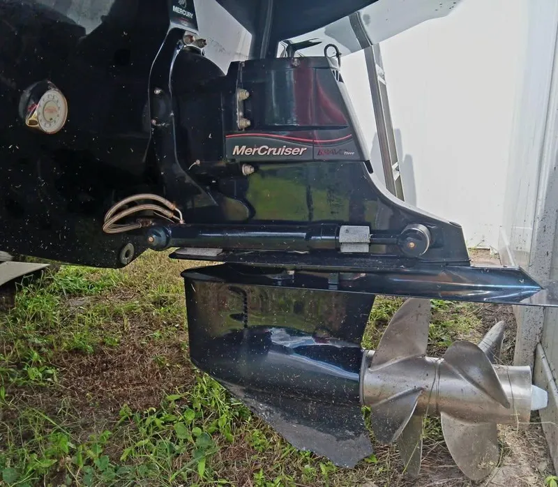 Slide: The Image of MerCruiser engine on 2017 Crownline 275 SS boat, showing propeller and drive unit. - 10