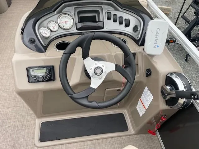 Slide: The Image of Steering console of 2022 Sun Tracker Party Barge 20 DLX with Garmin navigation system. - 15