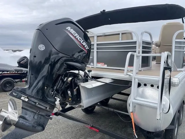 Slide: The Image of 2022 Sun Tracker Party Barge 20 DLX pontoon boat with Mercury outboard motor. - 7