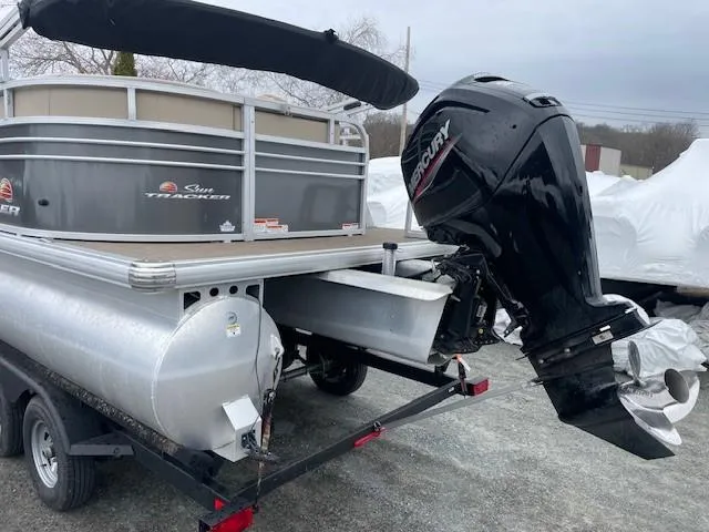Slide: The Image of 2022 Sun Tracker Party Barge 20 DLX with Mercury outboard motor on trailer. - 8