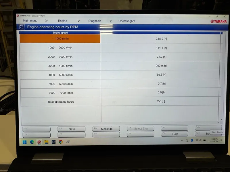 Slide: The Image of Laptop displaying Yamaha engine operating hours by RPM for Pursuit 2470 CC, 2004 model. - 38