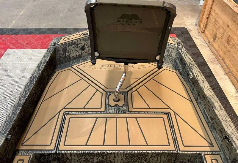 Slide: The Image of 2025 Tracker Grizzly® 1650 T Prairie Wings Edition boat interior with custom seating and flooring. - 6