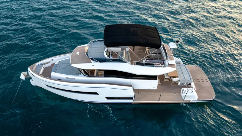 Slide: The Image of 2024 Pardo Yachts E60 luxury yacht cruising on open water. - 10