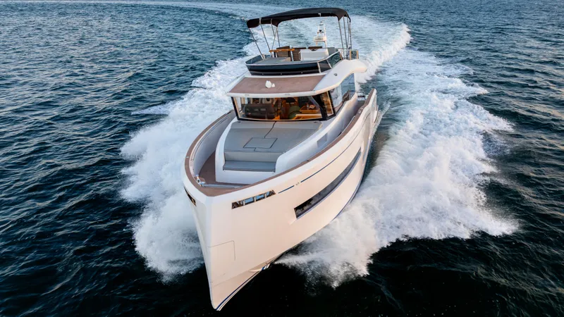 Slide: The Image of 2024 Pardo Yachts E60 cruising on open water, showcasing sleek design and luxury features. - 2