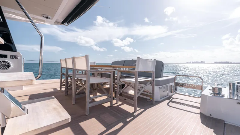 Slide: The Image of Luxurious 2024 Pardo Yachts E60 deck with dining area overlooking the ocean. - 42